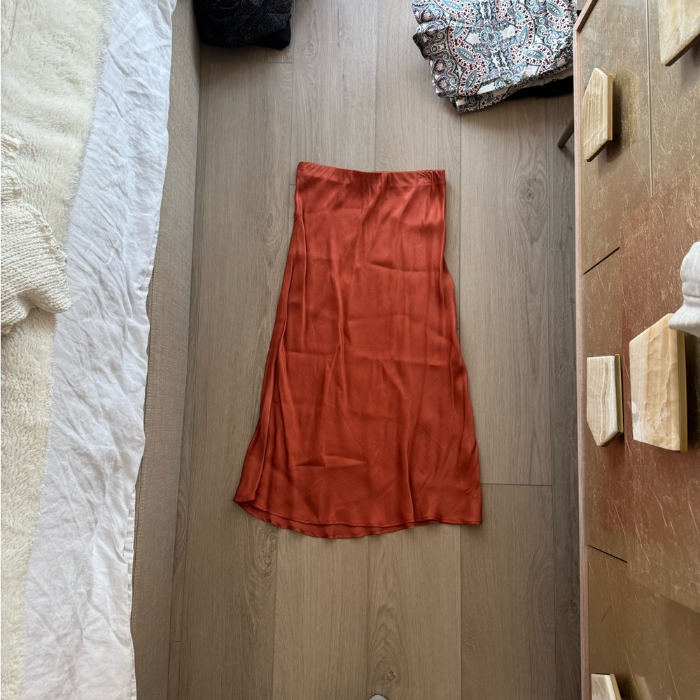 Orange satin midi skirt